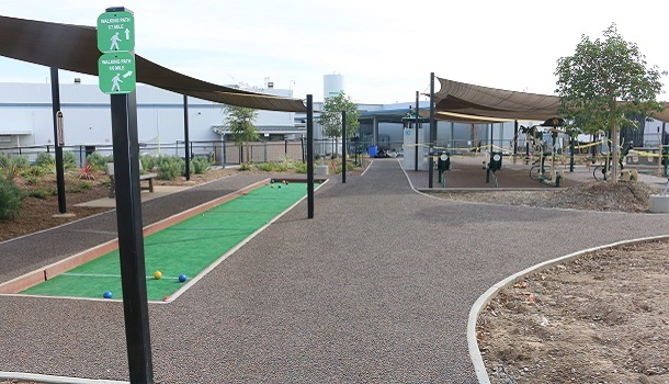 Rubberway Rubber Surfacing Around Outdoor Bocce Ball Court at Corporate Campus